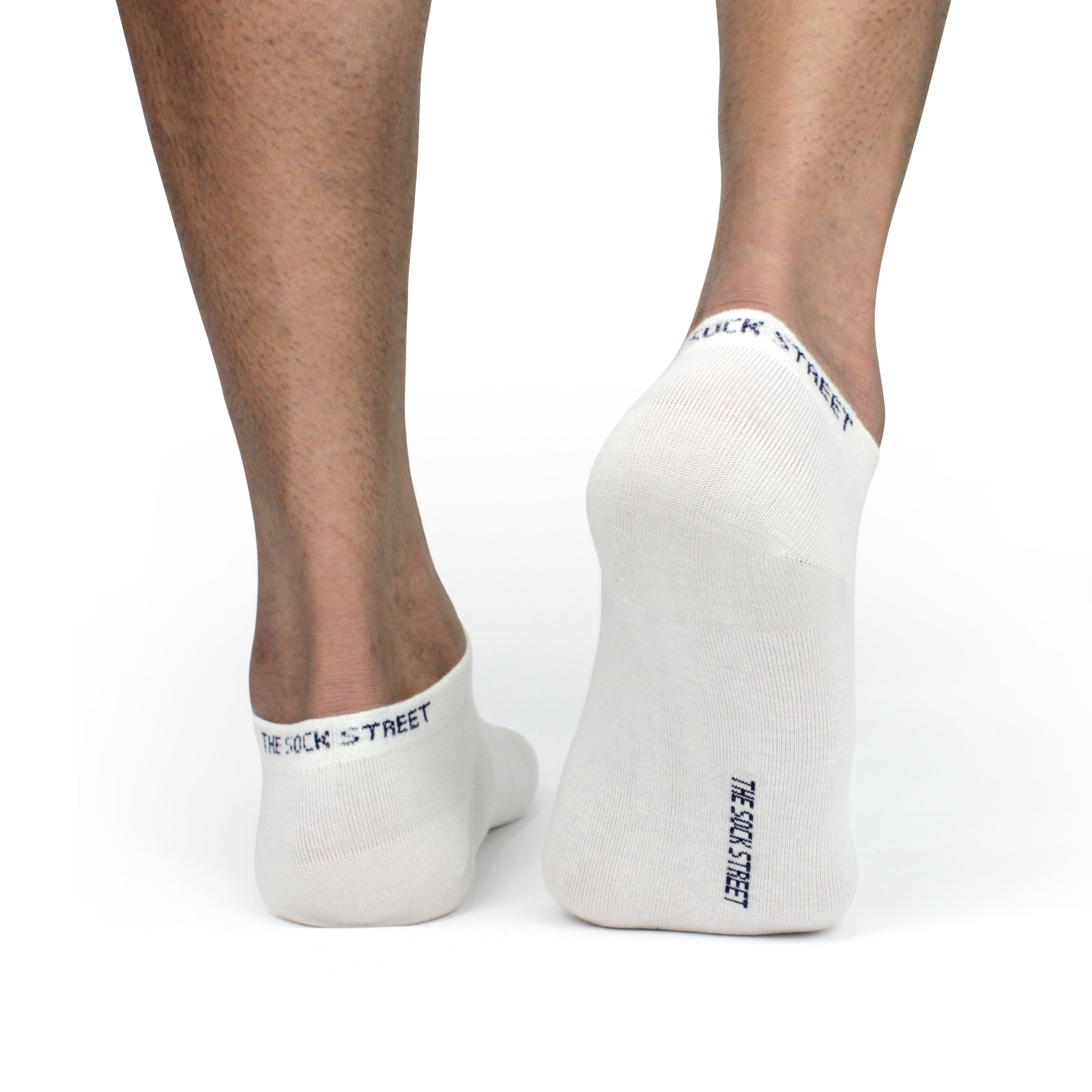 White ankle socks from The Sock Street, breathable combed cotton, durability for daily wear.